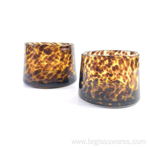 Trapzoid shaped swirl glass candle holder with leopard pattern